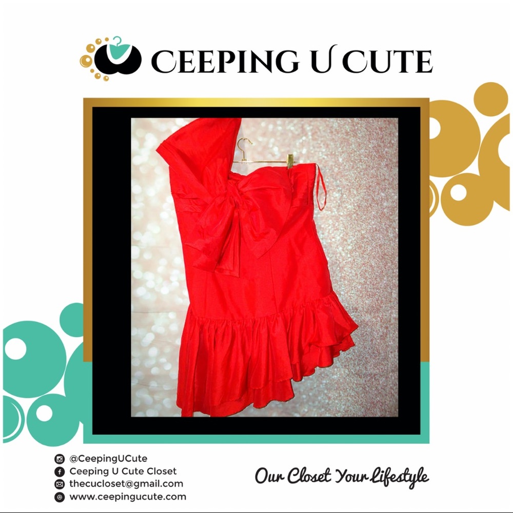 Red formal dress with large bow in the front across the chest.
